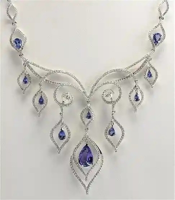 प्रमाणित 0.61 Ctw I2/I3 Tanzanite और डायमंड 14K रोज़ गोल्ड ईयररिंग्स