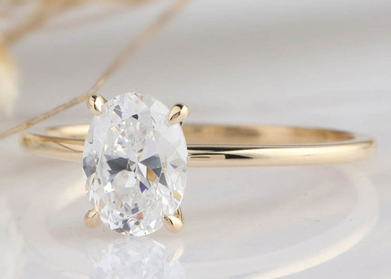 1.5ct ओवल कट लैब ग्रोन मोइसानाइट रिंग 14K गोल्ड मटेरियल 0.7×0.9cm आकार